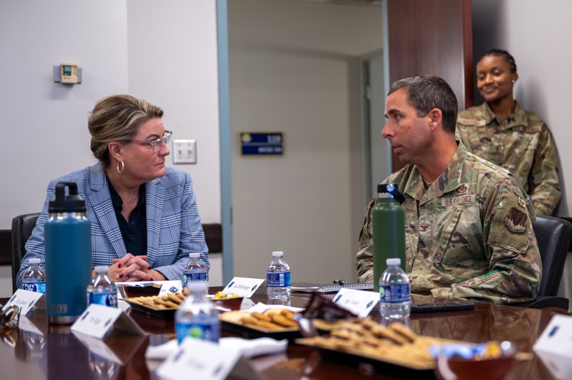 Airman talks to civilian. (U.S. Air Force photo by Airman 1st Class Donnell Ramsey)