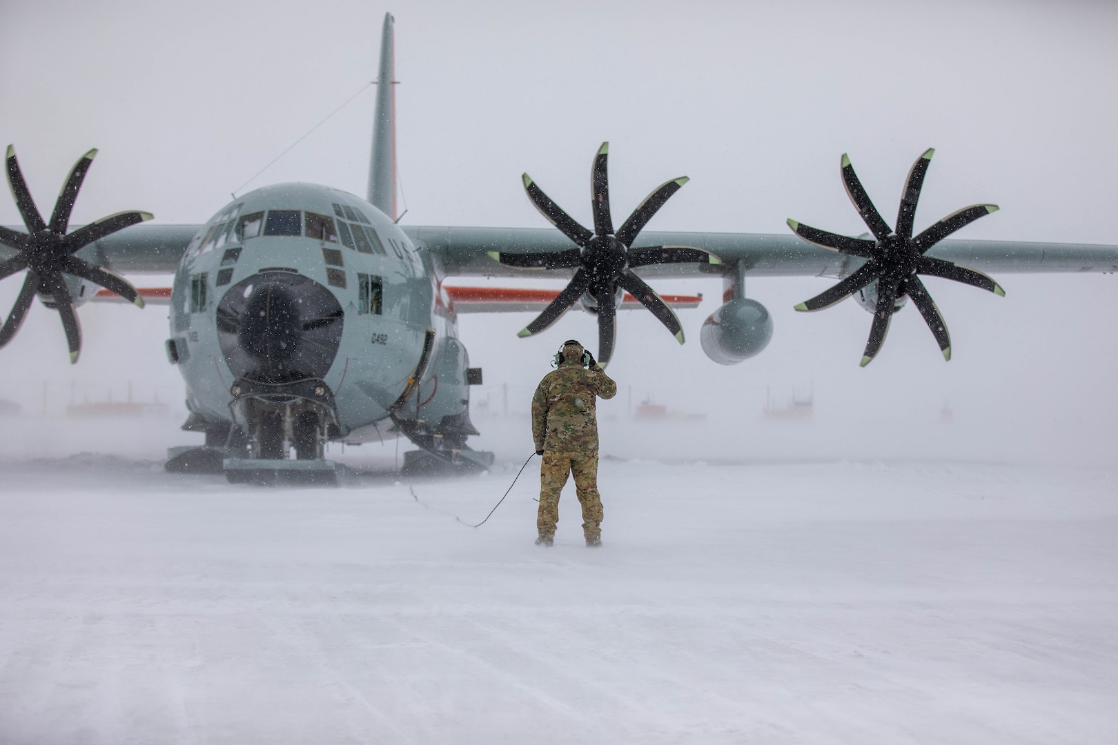 Master Sgt. Geoff Cerrone, a loadmaster assigned to the 139th Airlift Squadron, part of the 109th Airlift Wing, prepares a LC-130 Hercules for departure at McMurdo Station, Antarctica.