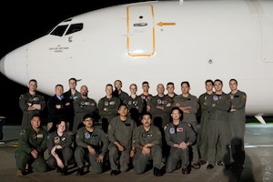Sailors, Airmen pose for a photo