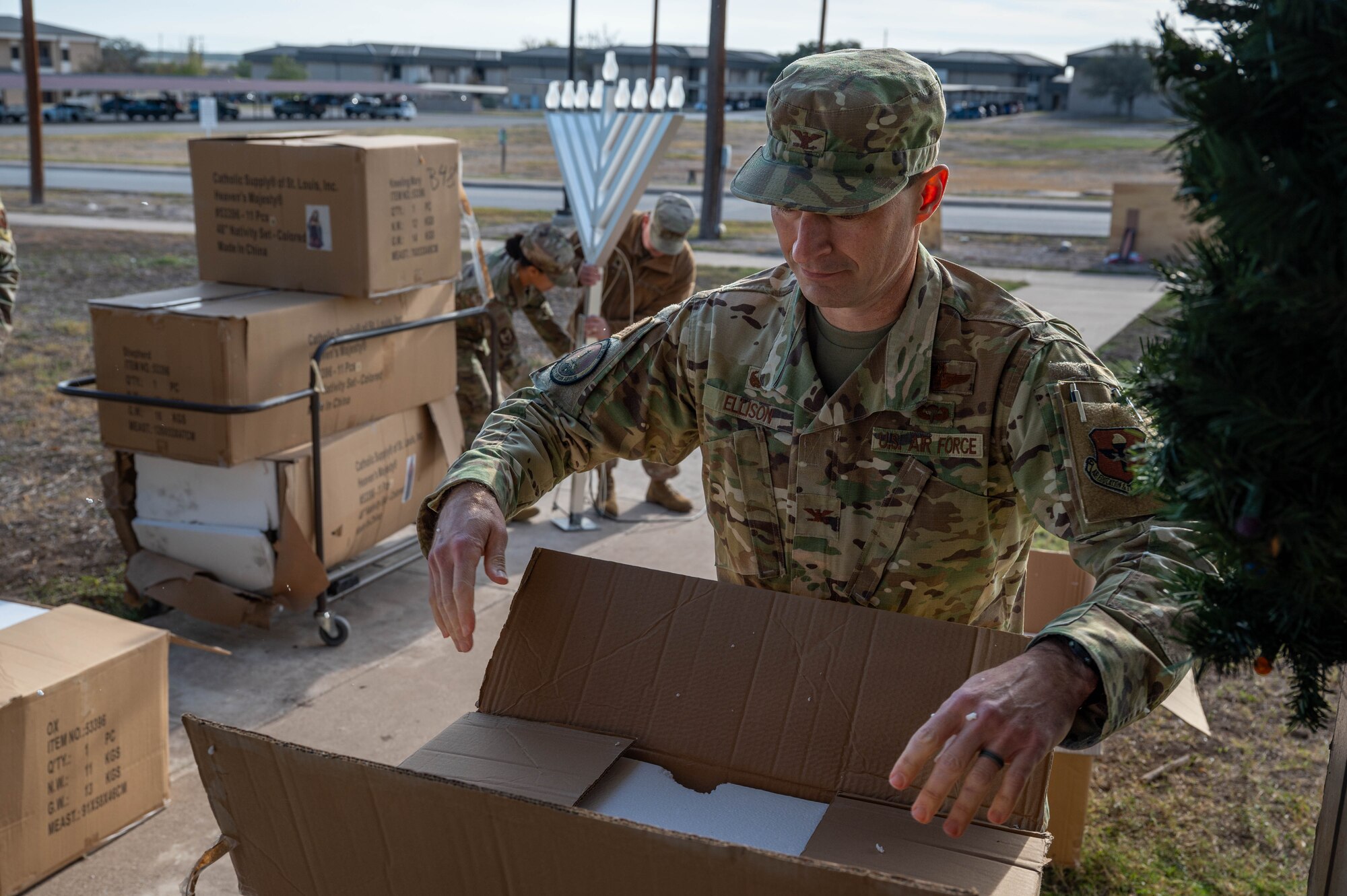 Col. Ellison and Chief Garza visited the Chapel to help set up decorations to celebrate Christmas and prepare for this year’s upcoming Christmas Tree lighting, an event marking the beginning of the holiday season for the base community.