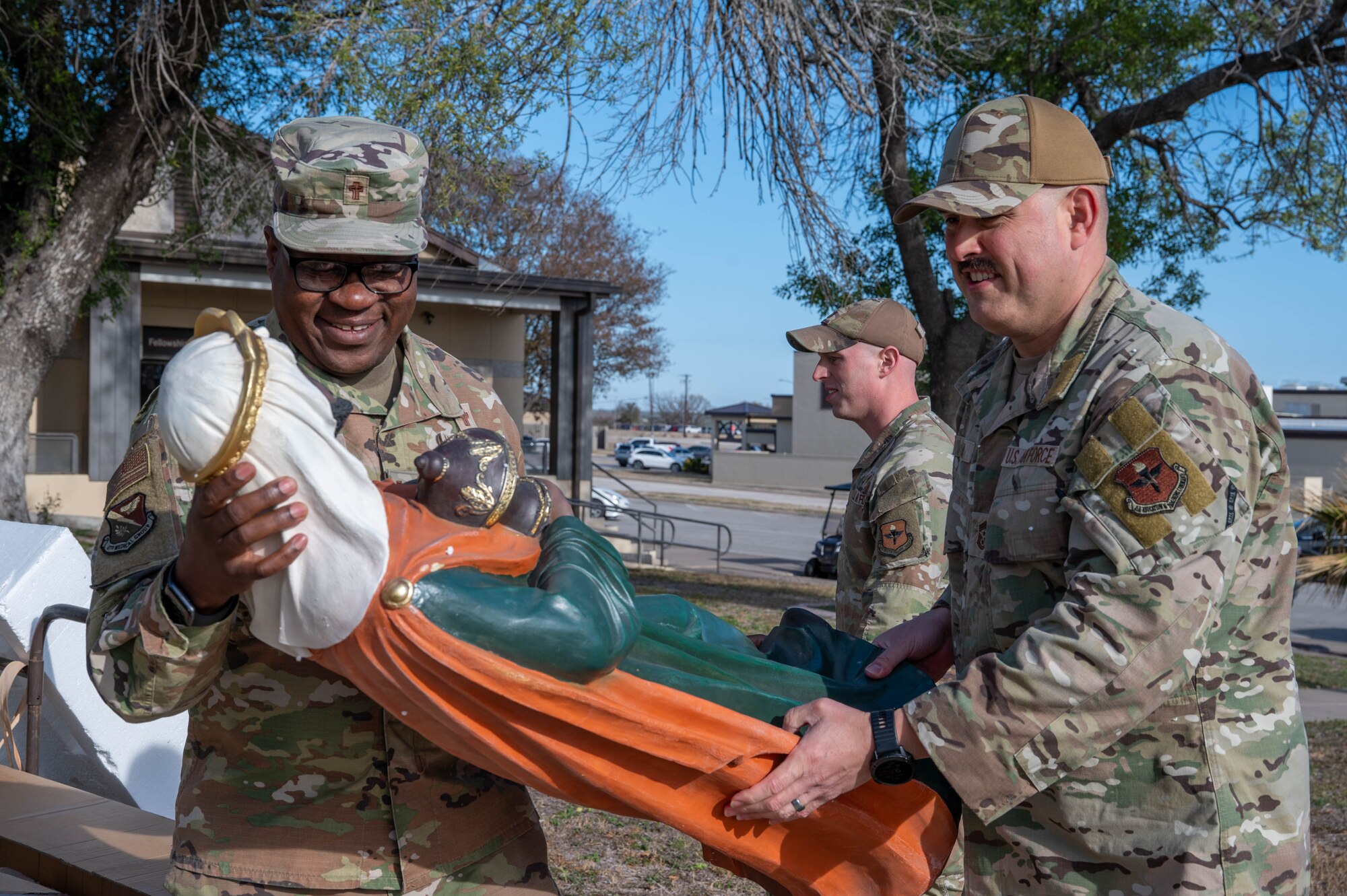 Col. Ellison and Chief Garza visited the Chapel to help set up decorations to celebrate Christmas and prepare for this year’s upcoming Christmas Tree lighting, an event marking the beginning of the holiday season for the base community.