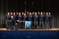 U.S. Space Force officer trainees wear their new service dress for a class photo in preparation for Officer Training School graduation at Maxwell Air Force Base, Alabama, Dec. 4, 2025. The dawn of a new era in military service unfolds as the first newly commissioned U.S. Space Force Guardians to wear the service’s new dress uniforms graduated from OTS, symbolizing a significant milestone in the evolution of the U.S. Space Force.