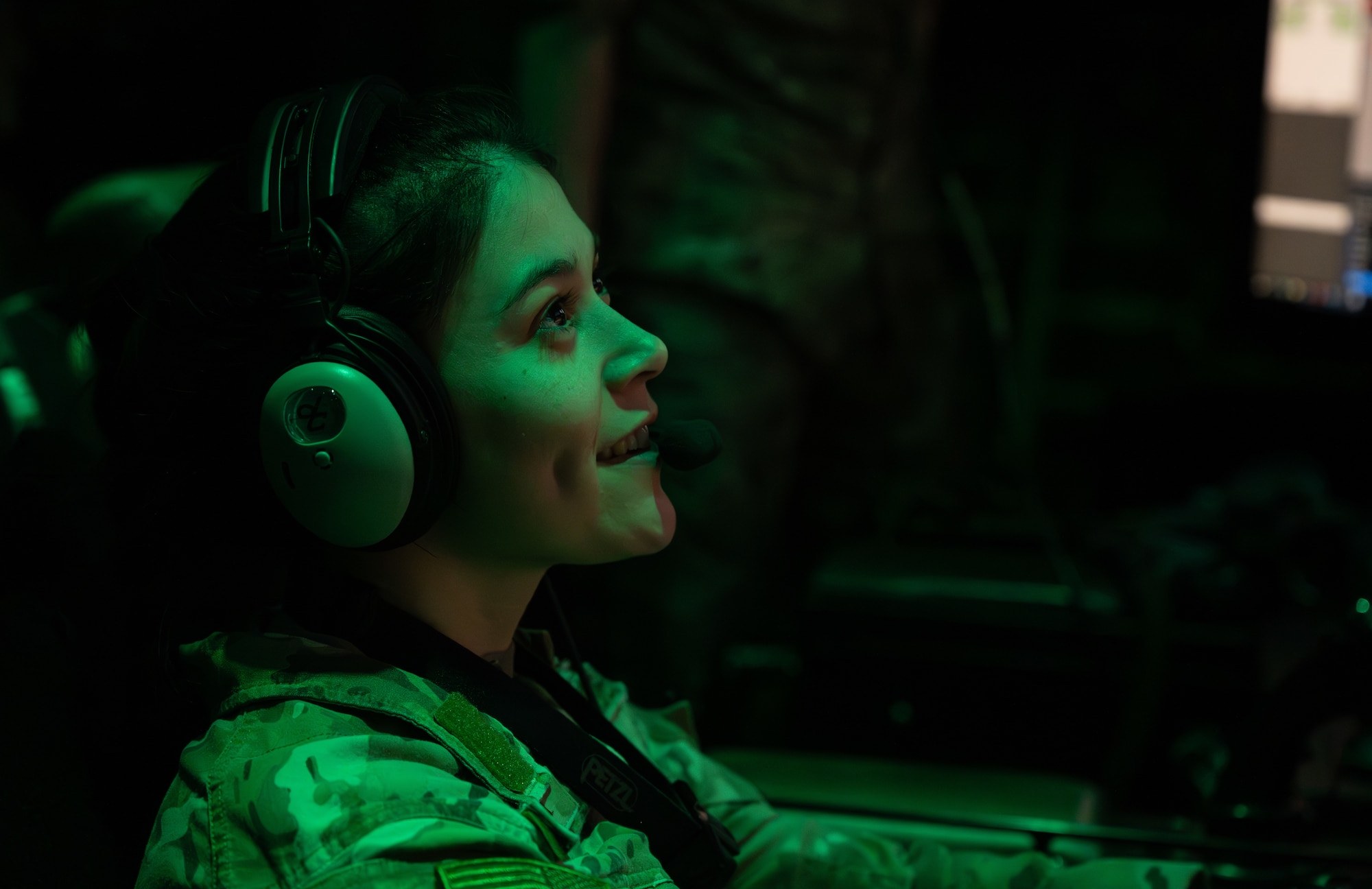 A U.S. Air Force AC-130J Ghostrider gunship weapons systems operator assigned to the 1st Special Operations Wing scans for targets above a range near Hurlburt Field, Florida, Nov. 12, 2025.