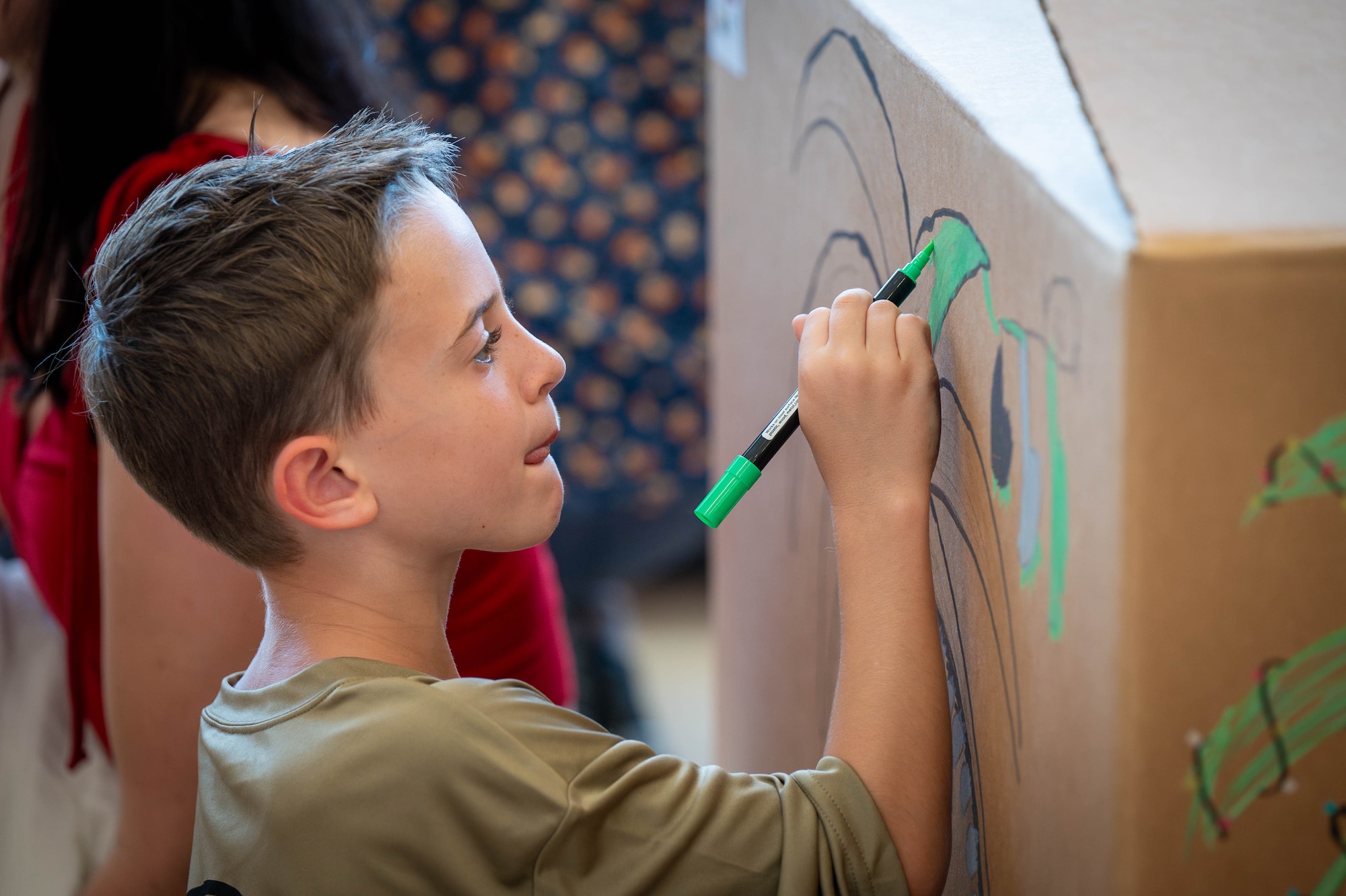 Volunteers decorate bundles.