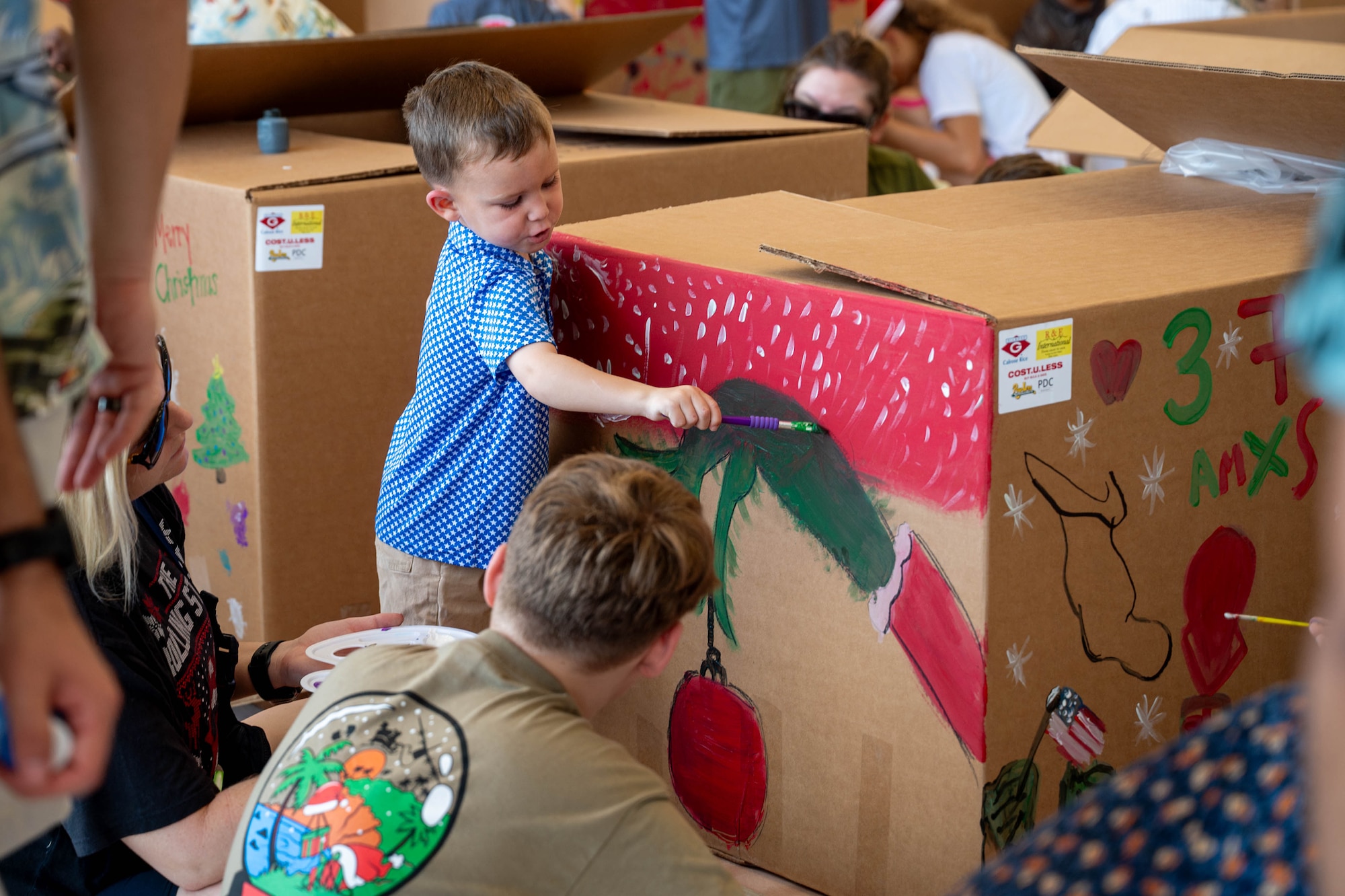 Service members and families decorate bundles