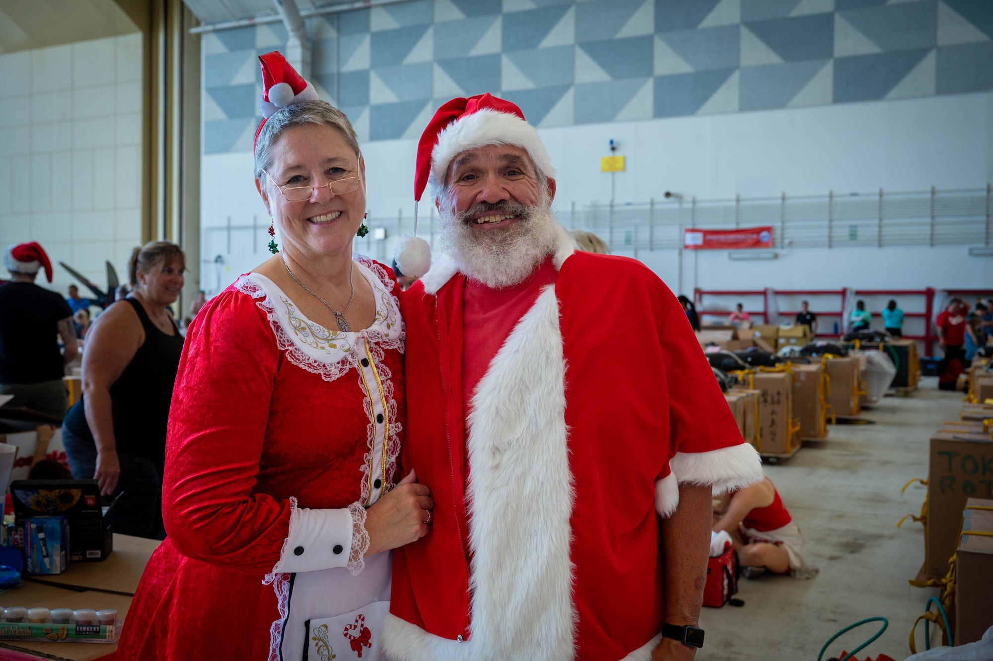 Beth and Jeff Roman, Operation Christmas Drop 2025 volunteers, pose for a photo.