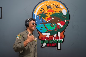 Airman poses for photo.