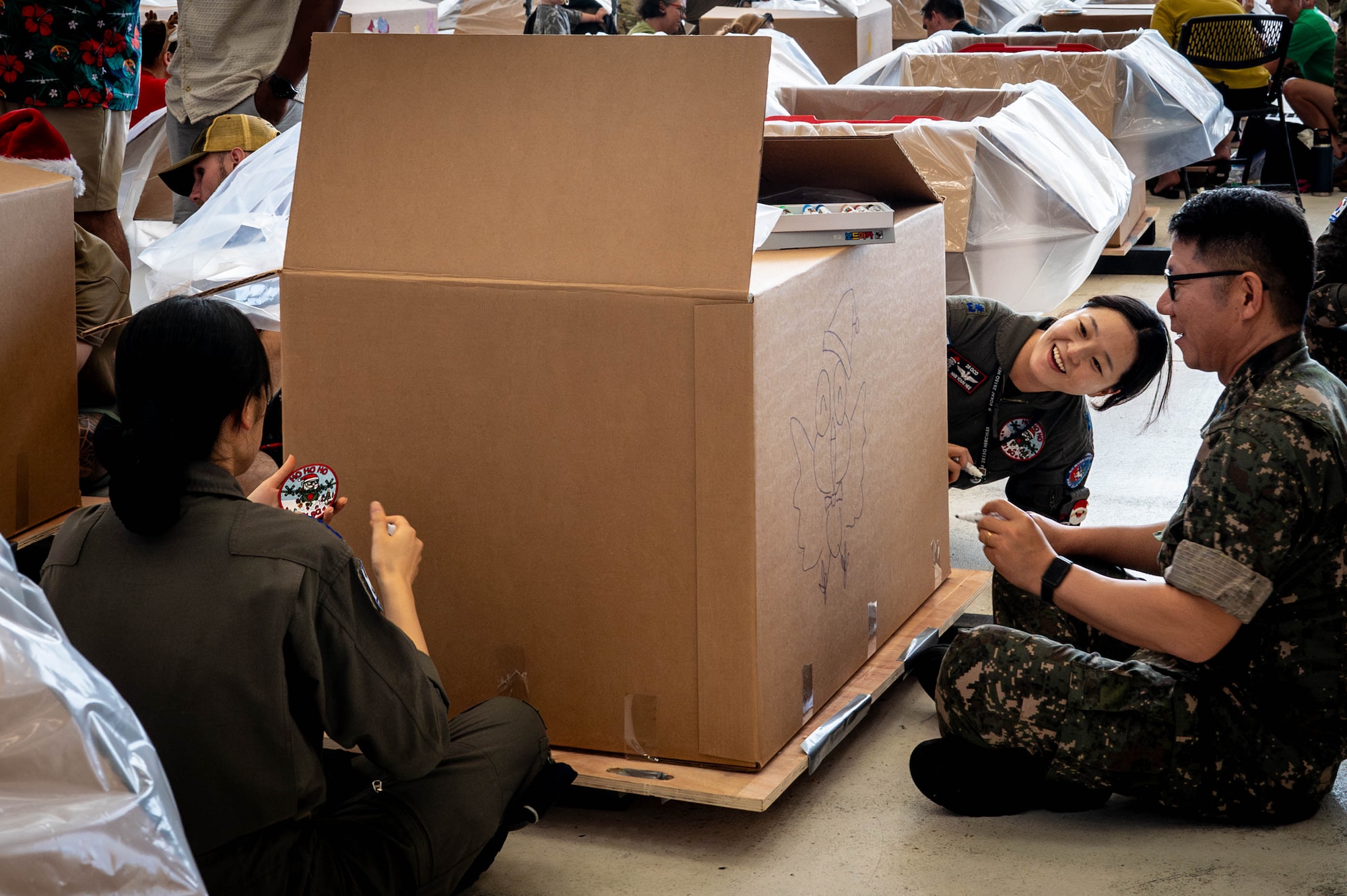 Members of the Republic of Korea military decorate bundles.