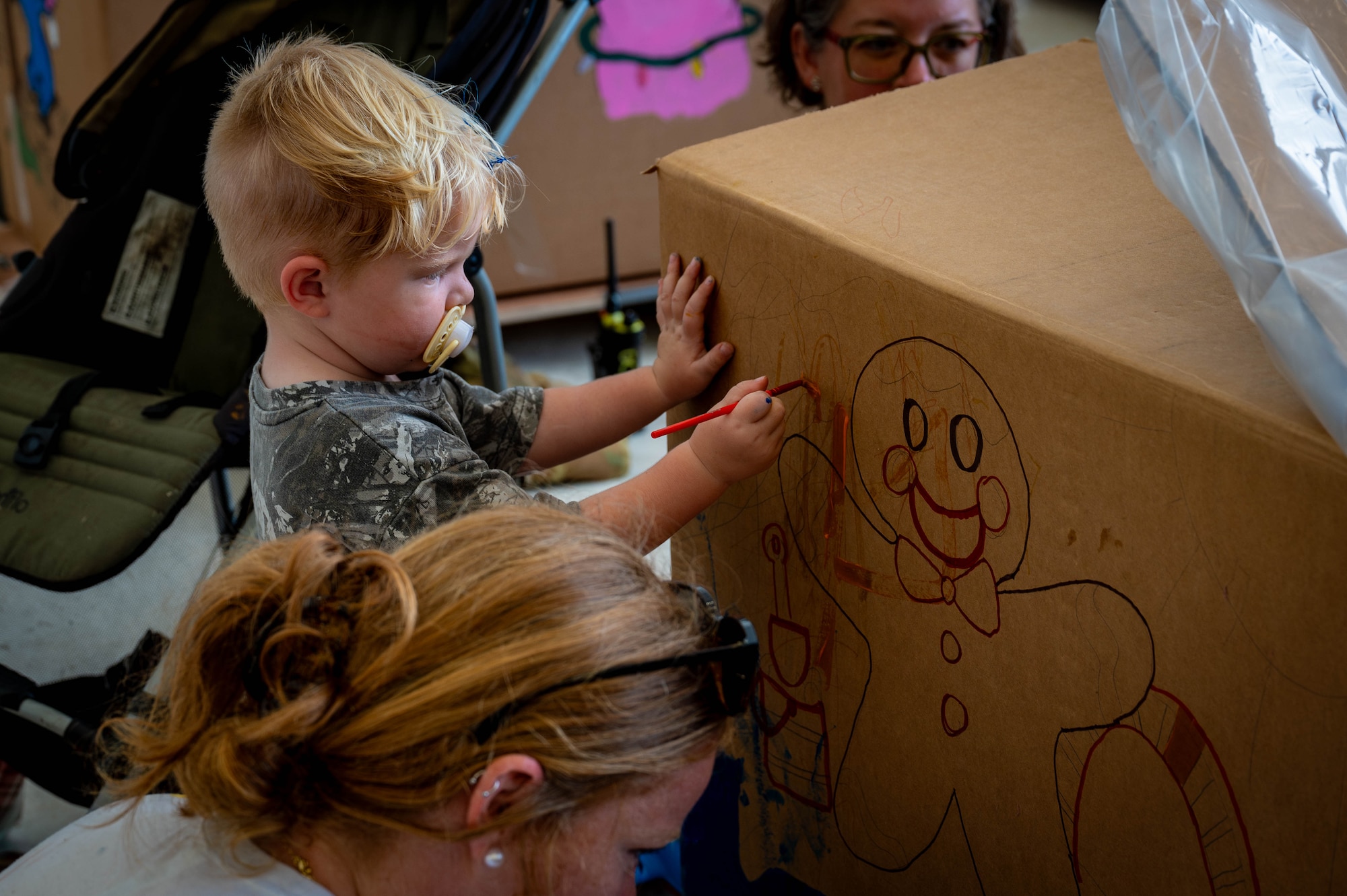 Volunteers decorate bundles.