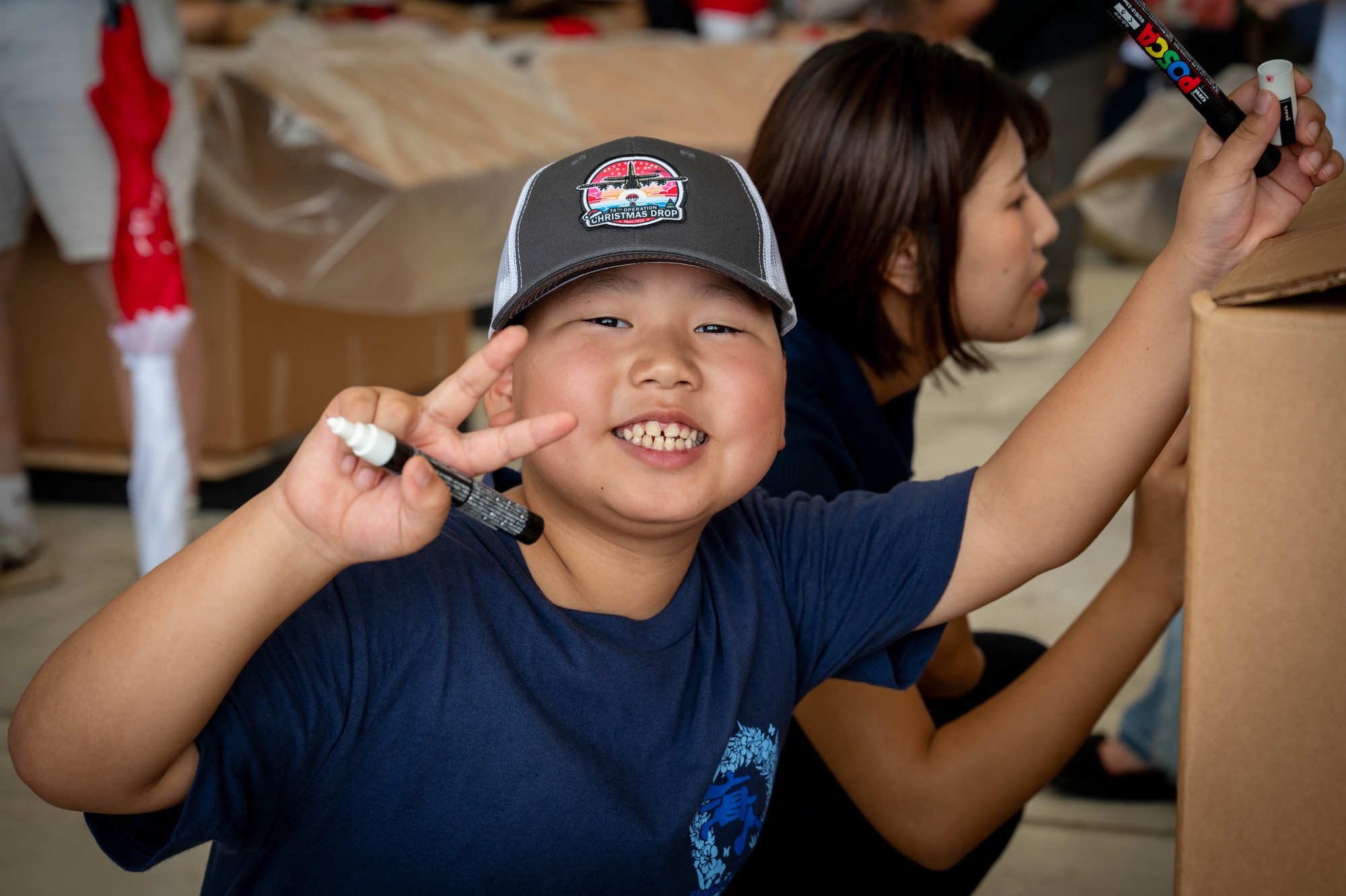 Volunteers decorate bundles.