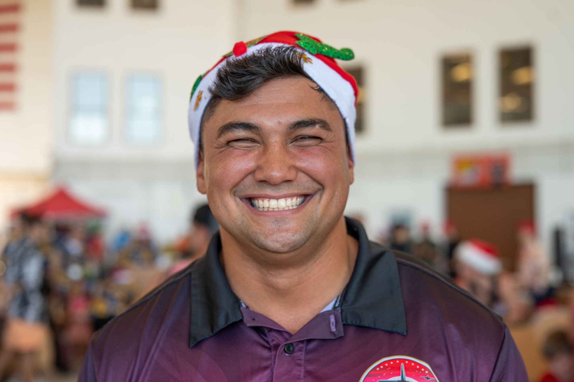 Airman smiles for portrait.
