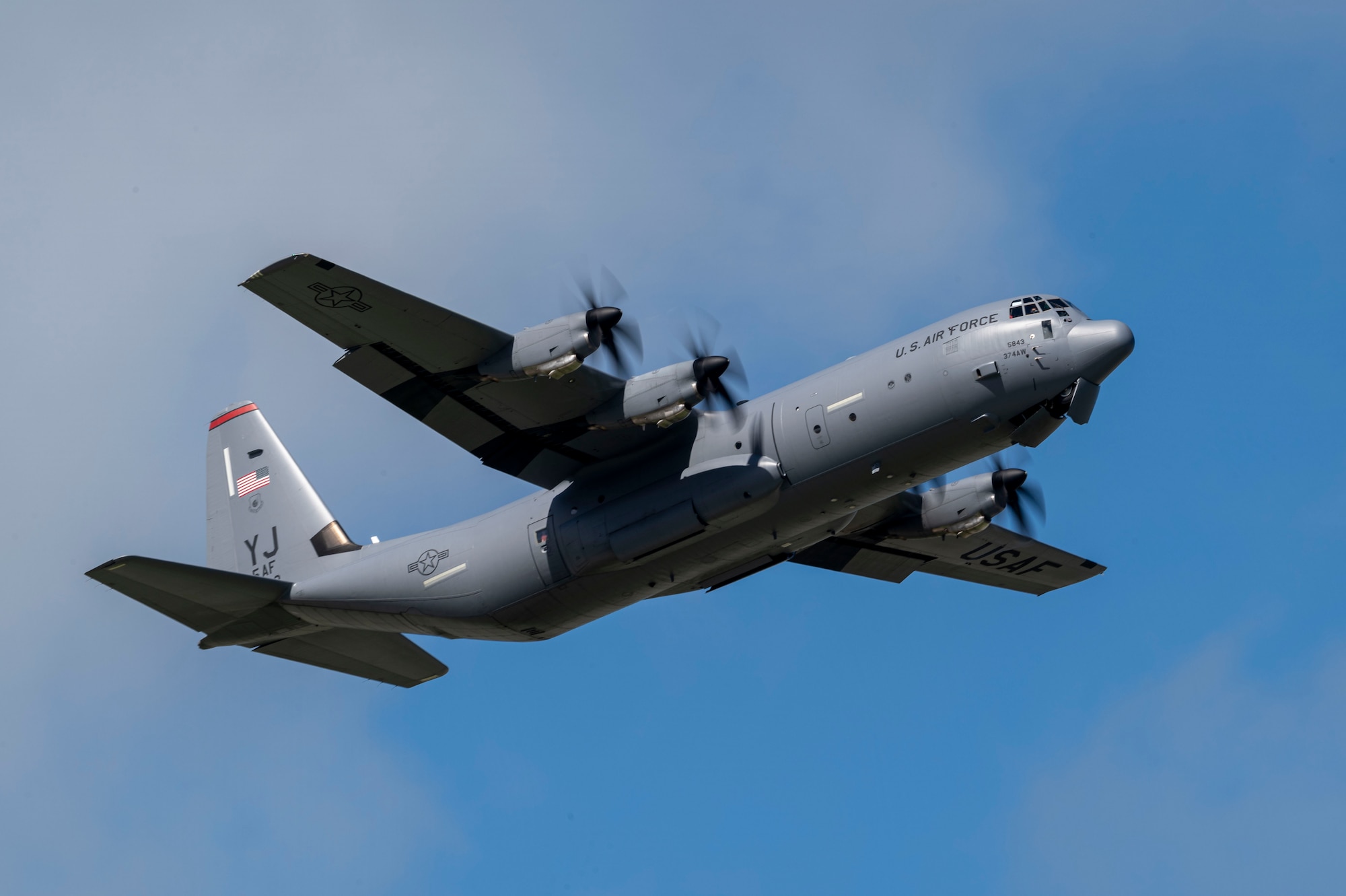 A C-130J aircraft takes flight.
