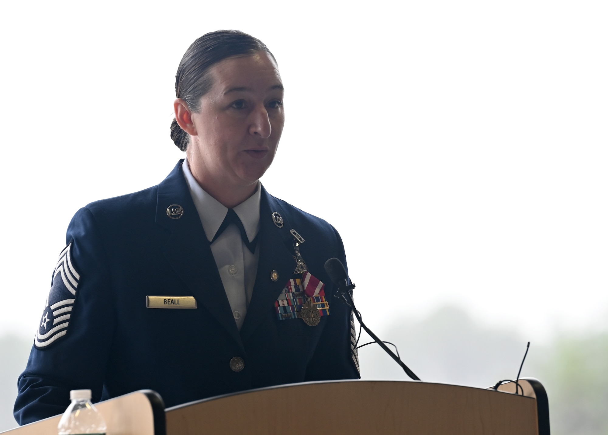 U.S. Air Force Chief Master Sgt. Jessica L. Beall addresses guests during her retirement ceremony at Francis S. Gabreski Air National Guard Base, Westhampton Beach, N.Y., Sept. 7, 2025.