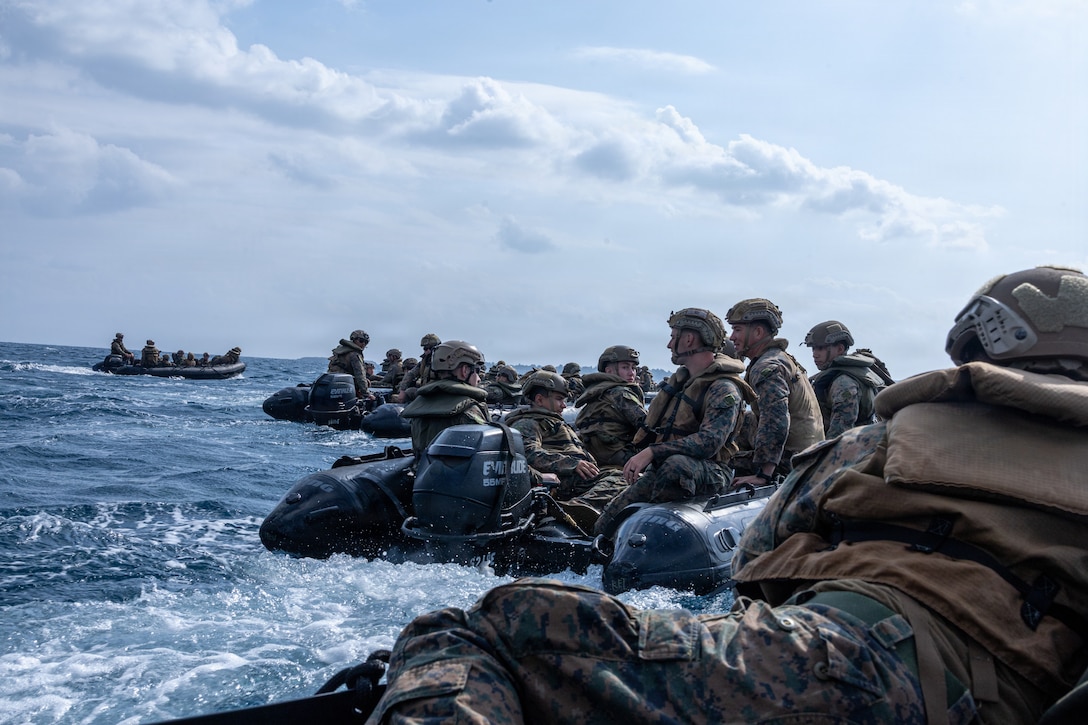 U.S. Marines with India Company, Battalion Landing Team 3rd Battalion, 1st Marine Regiment, 31st Marine Expeditionary Unit, navigate into a wedge formation during a small boat raid as part of MEU Exercise in Okinawa, Japan, Dec. 3, 2025. This training aimed to enhance the Marines ability to conduct boat raids using the enhanced combat rubber reconnaissance craft. The 31st MEU, the Marine Corps’ only continuously forward deployed MEU, provides a flexible and lethal force, ready to perform a wide range of military operations as the premiere crisis response force in the Indo-Pacific region. (U.S. Marine Corps photo by Cpl. Rebeka Falcon)