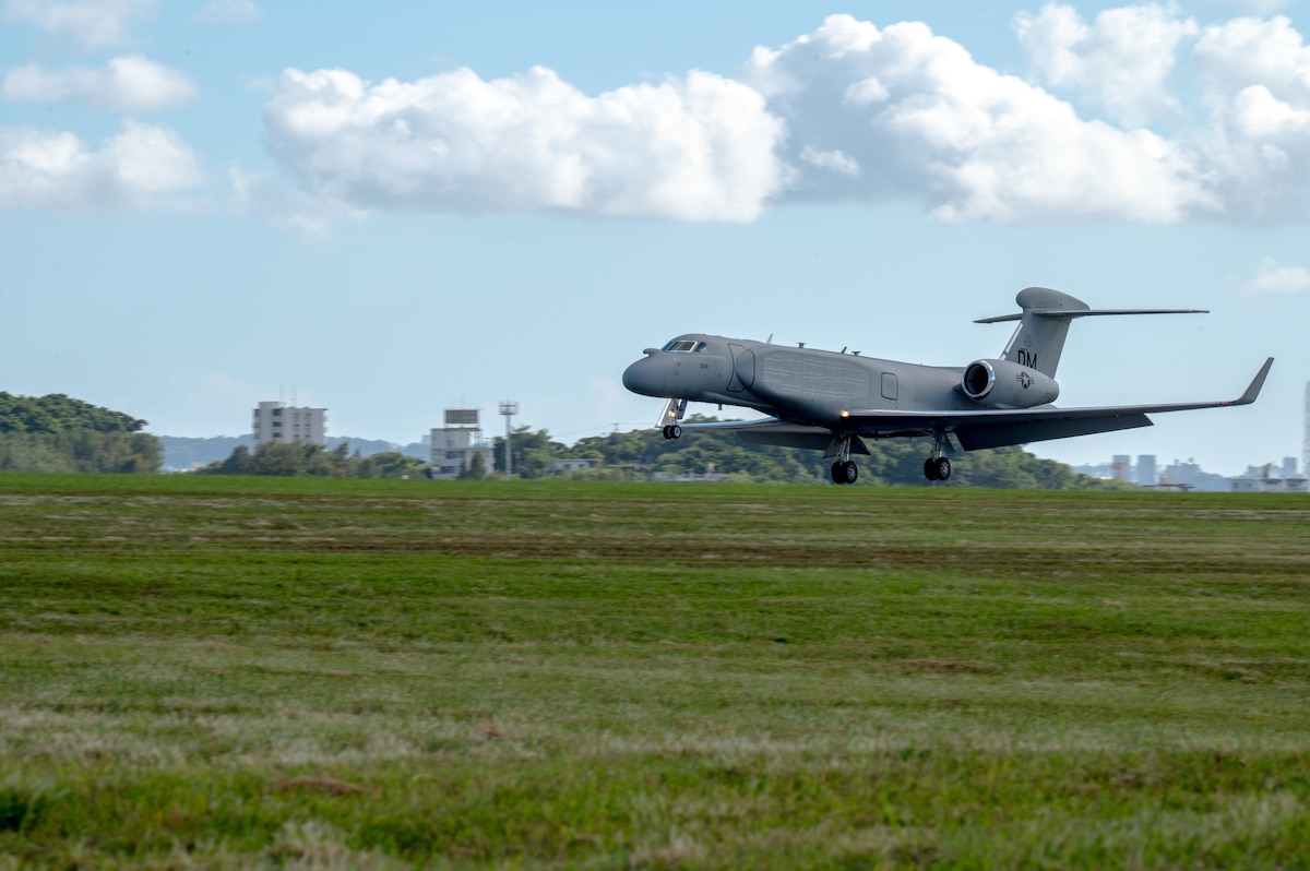 A U.S. Air Force EA-37B Compass Call assigned to the 55th Electronic Combat Group prepares for landing at Kadena Air Base, Japan, Sept. 27, 2025. The EA-37B Compass Call is a next-gen electronic attack aircraft that disrupts enemy networks and systems to ensure Joint Force dominance in the electromagnetic spectrum. (U.S. Air Force photo by Senior Airman Melany Bermudez)