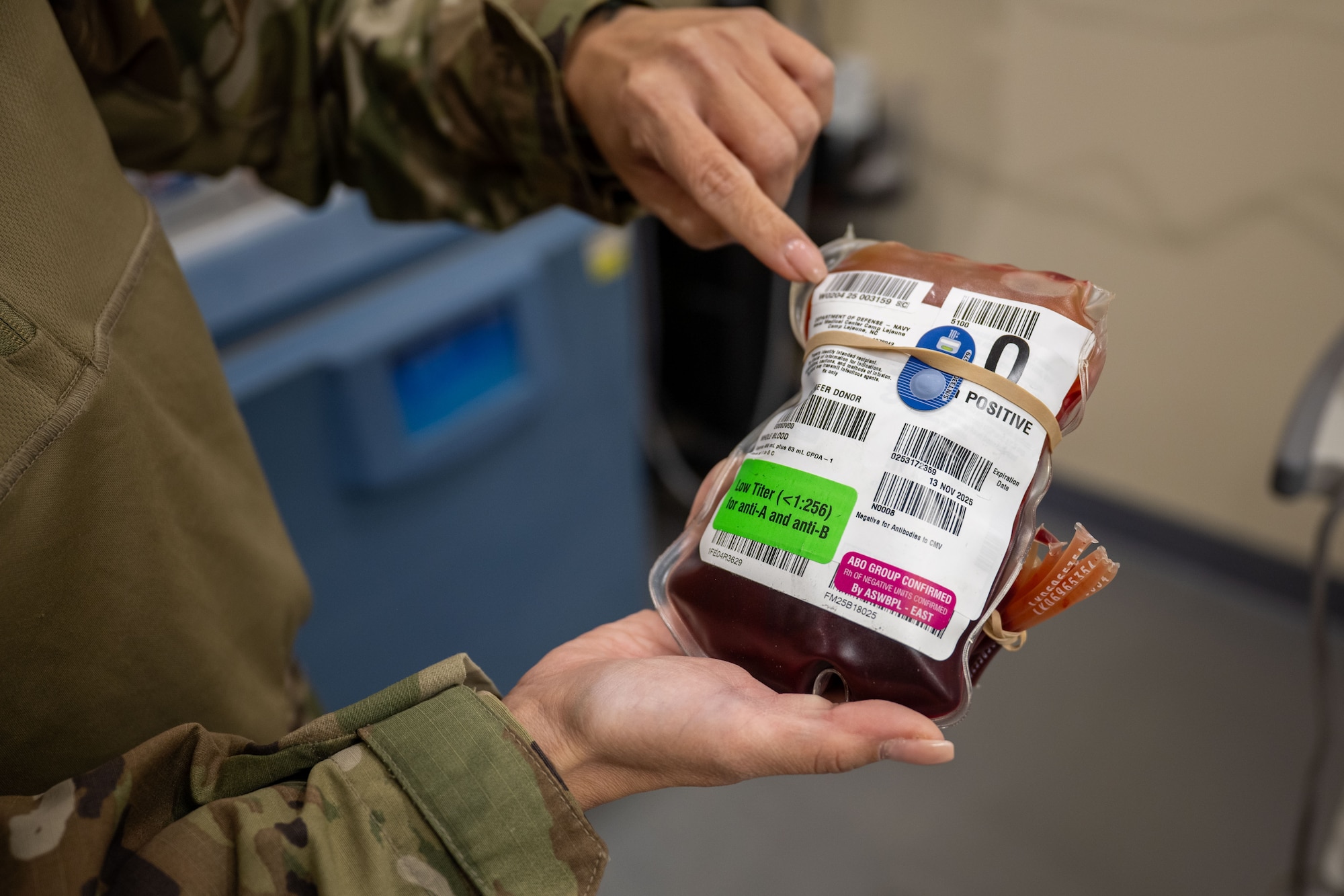 U.S. Air Force Master Sgt. Malissa Ross, 332nd Expeditionary Medical Squadron laboratory noncommissioned officer in charge, holds a container of blood in the U.S. Central Command area of responsibility, Nov. 13, 2025