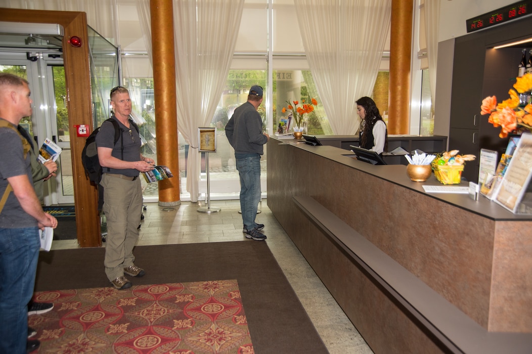 Ivette Garcia, Guest Services Representative, checks in a group of arrivals, Apr. 25, 2019, Spangdahlem Air Base, Germany. The Eifel Arms Inn accommodates members waiting to PCS, new arrivals waiting to move off base or members here on TDY.