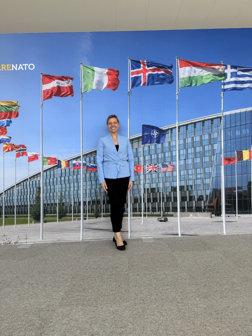 INSS Senior Policy Fellow Sarah Gamberini stands in front of NATO Headquarters in April 2025.