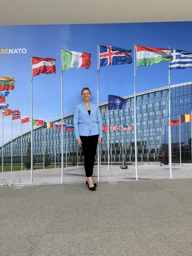 INSS Senior Policy Fellow Sarah Gamberini stands in front of NATO Headquarters in April 2025.