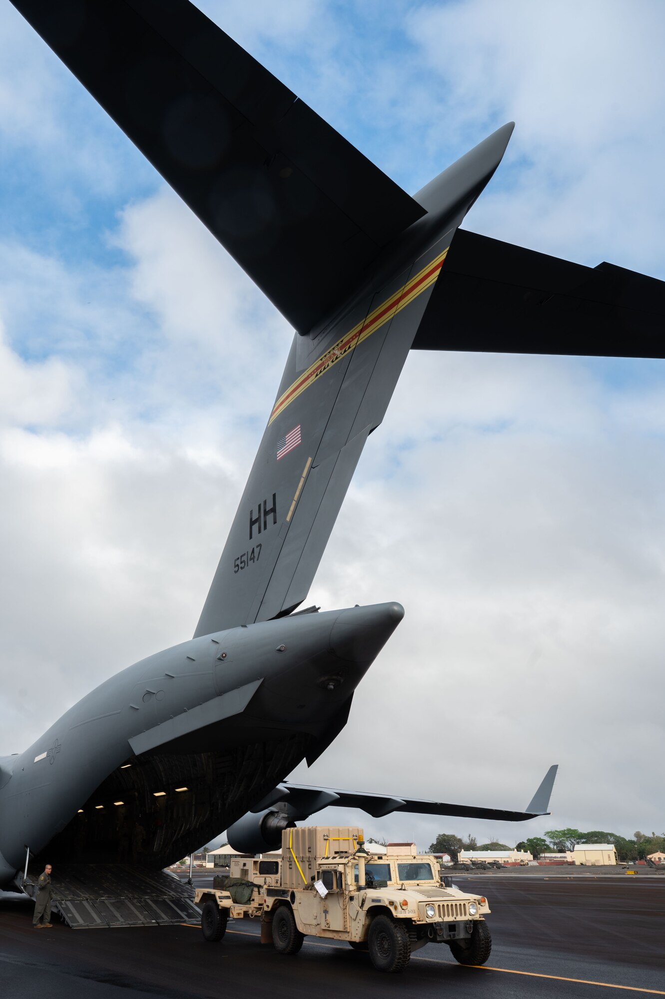 A U.S. Army Humvee, assigned to the 25th Infantry Division, is loaded into a U.S. Air Force C-17 Globemaster III, assigned to the 154th Airlift Wing, during Joint Pacific Multinational Readiness Center 26-01 at Wheeler Army Airfield, Hawaii, Nov. 9, 2025. JPMRC 26-01 highlights the U.S. commitment to partnership and a free and open Indo-Pacific, bringing together U.S. Joint Force and multinational Allies and partners to strengthen defense relationships, foster interoperability, and generate readiness. (U.S. Air Force photo by Senior Airman Alondra Cristobal Hernandez)