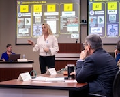 Lisa Hirschler, director of the Business Transformation Office for the U.S. Army Aviation and Missile Command, discusses AMCOM’s Advanced Manufacturing initiatives during the Army Materiel Command Advanced Manufacturing Summit at Redstone Arsenal, Alabama, Dec. 3, 2025. Hirschler highlighted partnerships, new production capabilities and recent successes such as field-printable replacement parts that strengthen Army readiness.