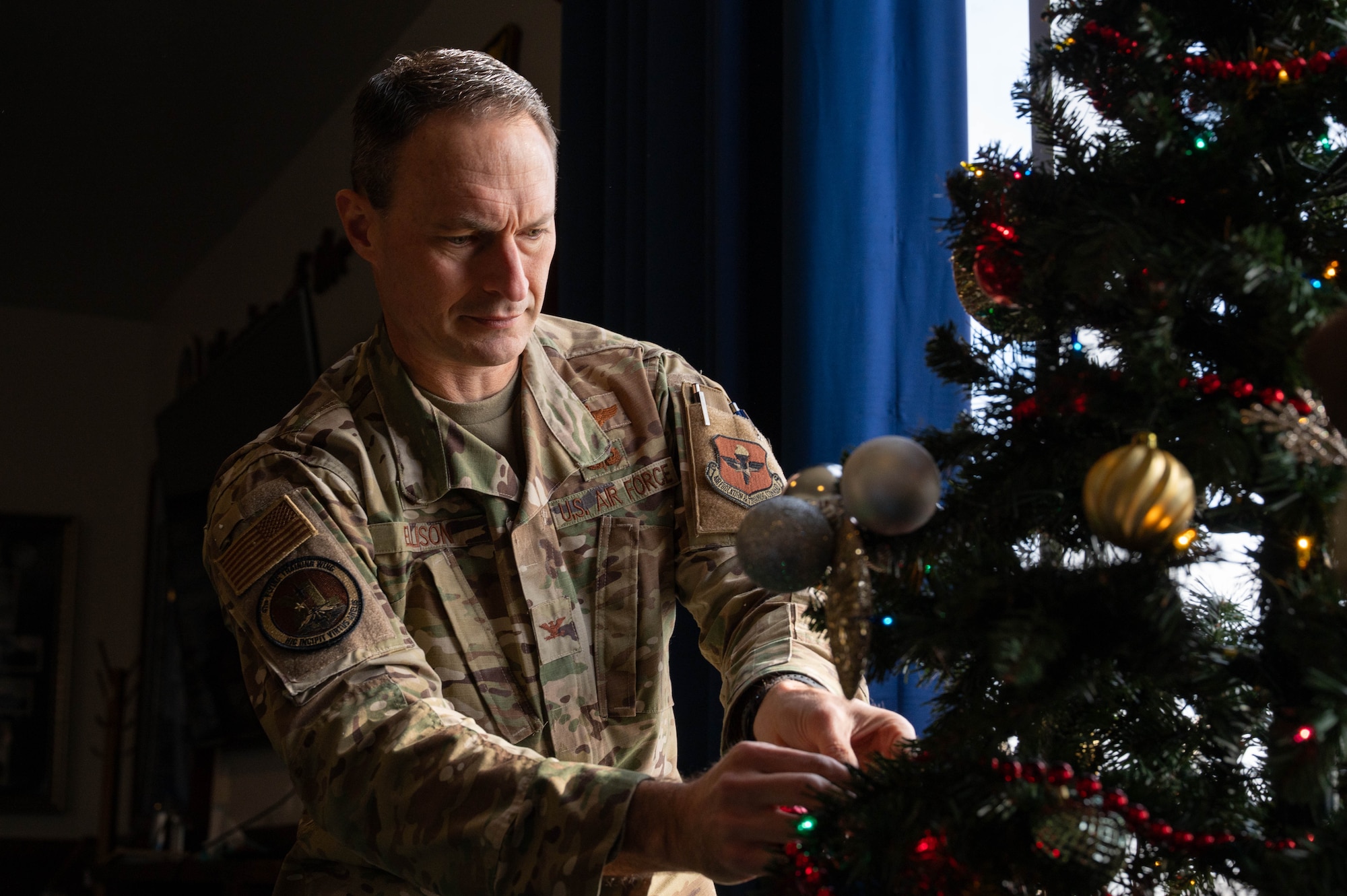 Col. Ellison and Chief Garza visited the Chapel to help set up decorations to celebrate Christmas and prepare for this year’s upcoming Christmas Tree lighting, an event marking the beginning of the holiday season for the base community.