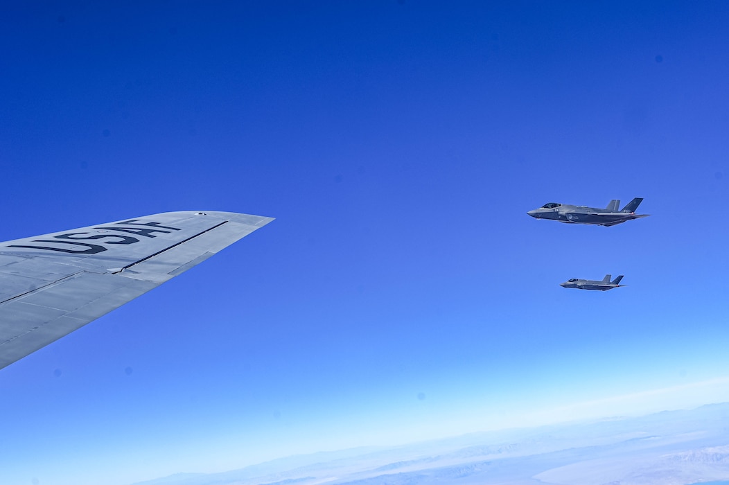 U.S. Air Force F-35A Lightning II’s assigned to the 56th Fighter Wing, fly beside aKC-135 Stratotanker assigned to the 161st Air Refueling Wing, Dec. 2, 2025, over the skies of Arizona.