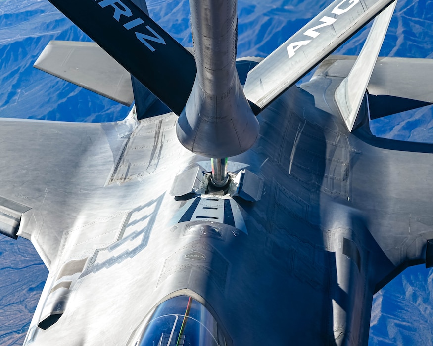 A U.S. Air Force F-35A Lightning II assigned to the 56th Fighter Wing attaches to the boom of a KC-135 Stratotanker assigned to the 161st Air Refueling Wing, to begin refueling, Dec. 2, 2025, over the skies of Arizona.