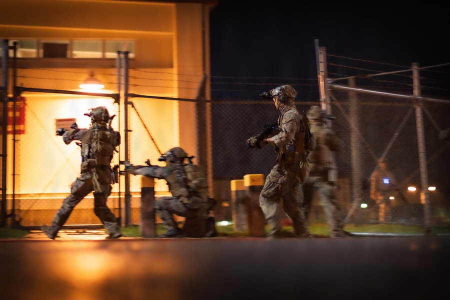 U.S. Marines with 3rd Reconnaissance Battalion, 3rd Marine Division, post security during an Expeditionary Operations Training Group Close Quarters Tactics Course at Camp Hansen, Okinawa, Japan, Oct. 28, 2025.