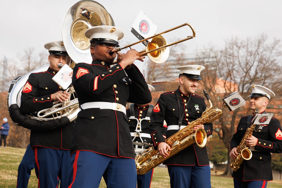 U.S. Marines in the Quantico Marine Band perform during the Toys for Tots toy drive in Arlington, Virginia, Dec. 6, 2025.  The basic mission of the Marine Toys for Tots Program is to collect new unwrapped toys and distribute those toys to less fortunate children during the holidays. (U.S. Marine Corps photo by Lance Cpl. David Brandes)