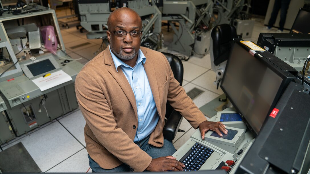 DAHLGREN, Va. – Rulx “Ro” Rosemond, a former U.S. Navy Aegis fire controlman and now a technical specialist and project lead for data links and sensors at Naval Surface Warfare Center Dahlgren Division, continues his lifelong mission of service by shaping how the Navy’s combat systems perform for the next generation. (Morgan Tabor/NSWCDD Photo)