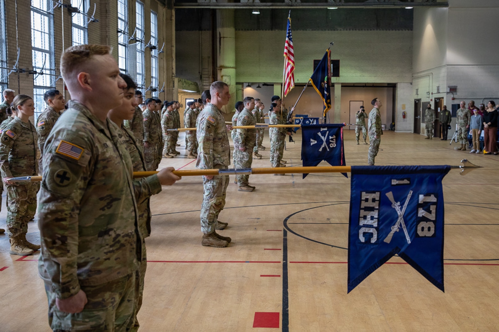 Illinois Army National Guard Soldiers of the 1st Battalion, 178th Infantry Regiment, present the colors during the playing of the national anthem.