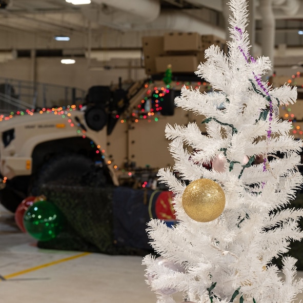 Photo of christmas tree and Humvee