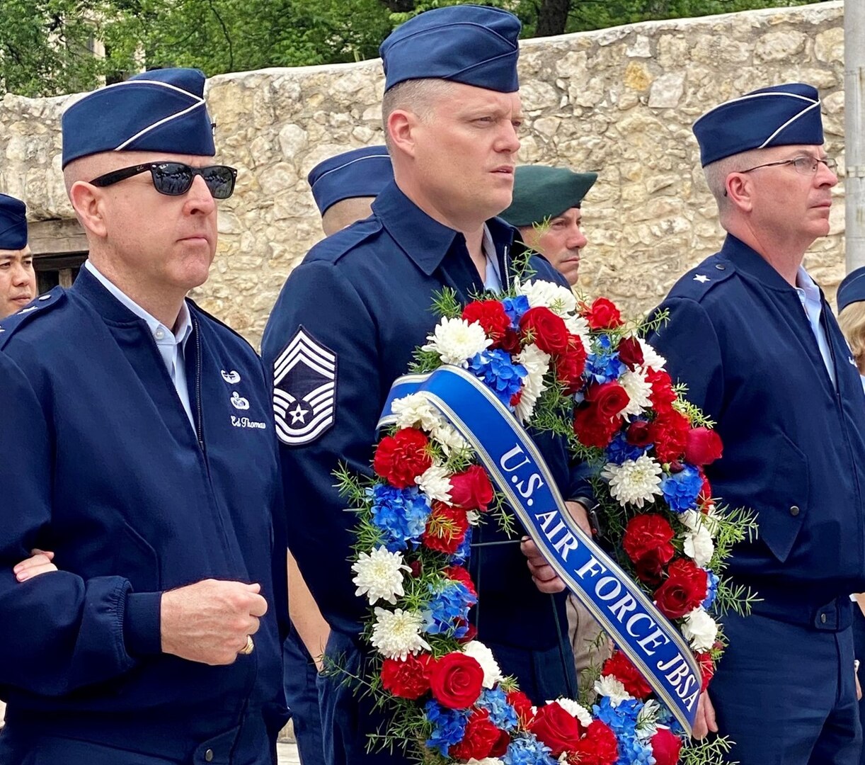 U.S. Air Force Chief Master Sgt. Frank Rawls, Air Force Recruiting Service carries a wreath during the 103rd Annual Pilgrimage to the Alamo in San Antonio, Texas, April 24, 2023