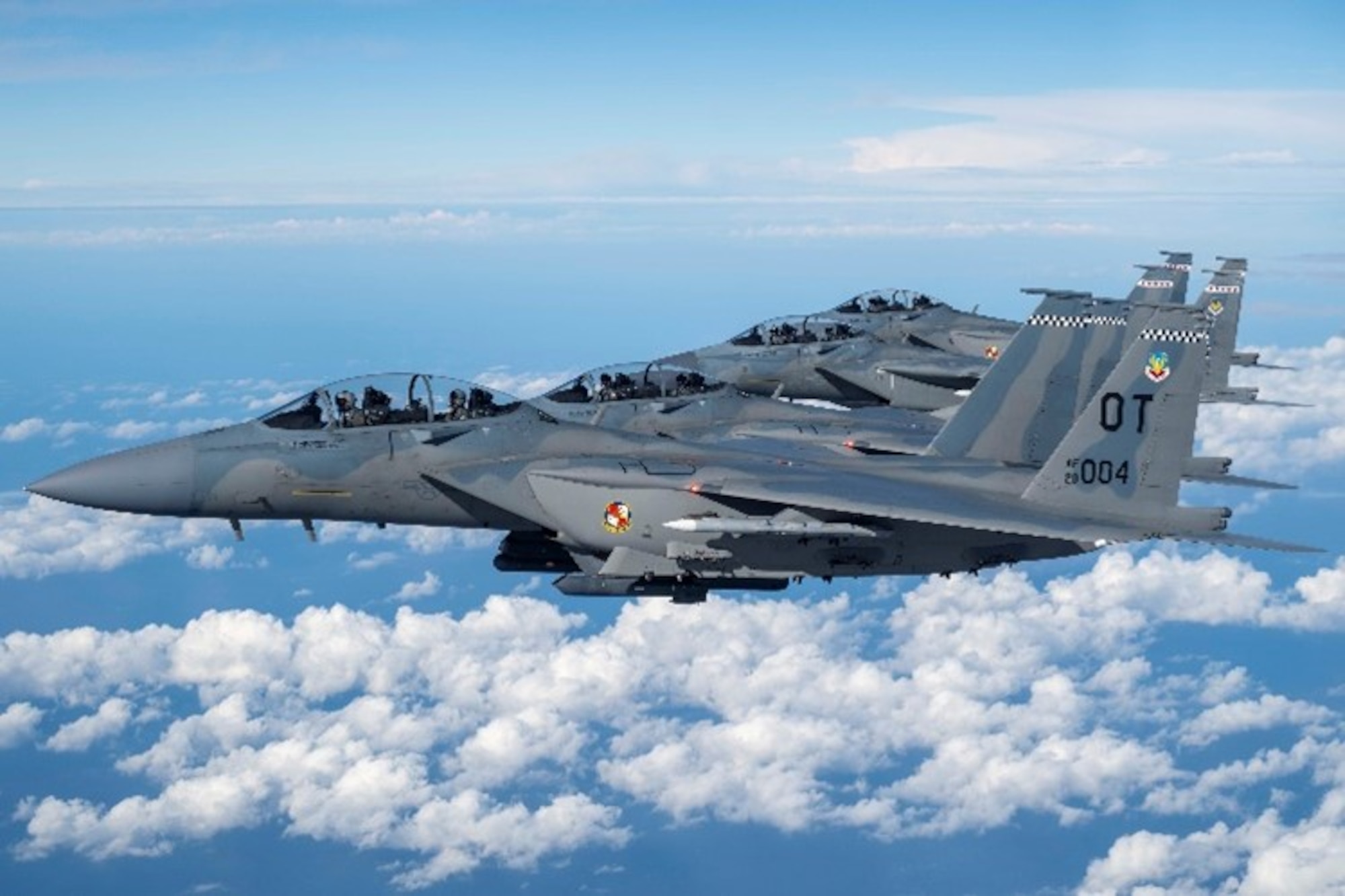 A formation of four U.S. Air Force F-15EX Eagle II fighter jets, assigned to Eglin Air Force Base, Florida, fly over the Gulf of America, Nov. 21, 2025. Secretary of the Air Force Troy Meink flew in the backseat of the lead jet as part of his visit to Eglin AFB. The flight oriented Meink to F-15EX tactics, techniques and procedures being developed and advanced by the 53d Wing to include weapons capacity, next-gen survivability, and next-generation radars, sensors and networking capabilities. (U.S. Air Force photo by Staff Sgt. Blake Wiles)
