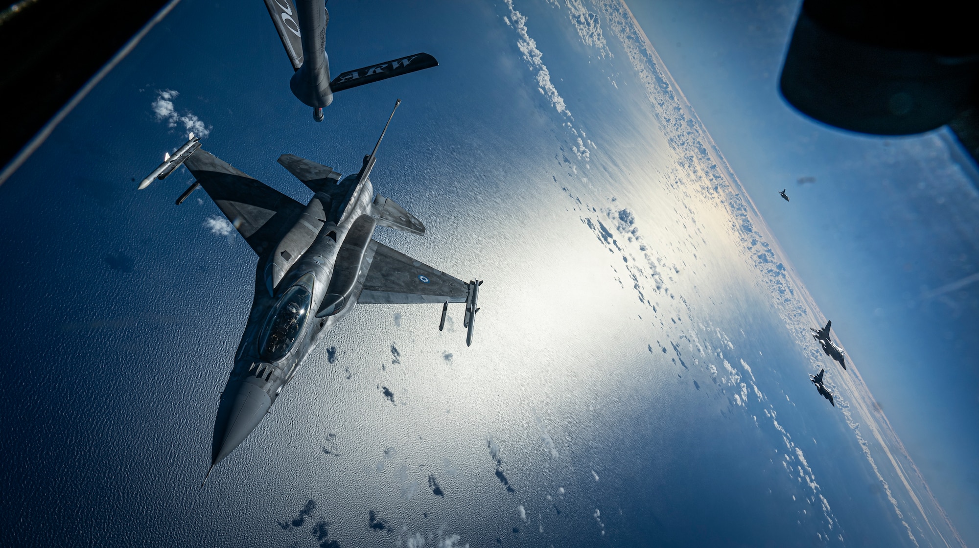 A Hellenic Air Force F-16D Fighting Falcon approaches a U.S. Air Force KC-135 Stratotanker assigned to the 100th Air Refueling Wing during exercise Falcon Strike over the Atlantic Ocean, Nov. 4, 2025. Falcon Strike provided an opportunity to strengthen ties with NATO Allies while maintaining a high level of readiness.