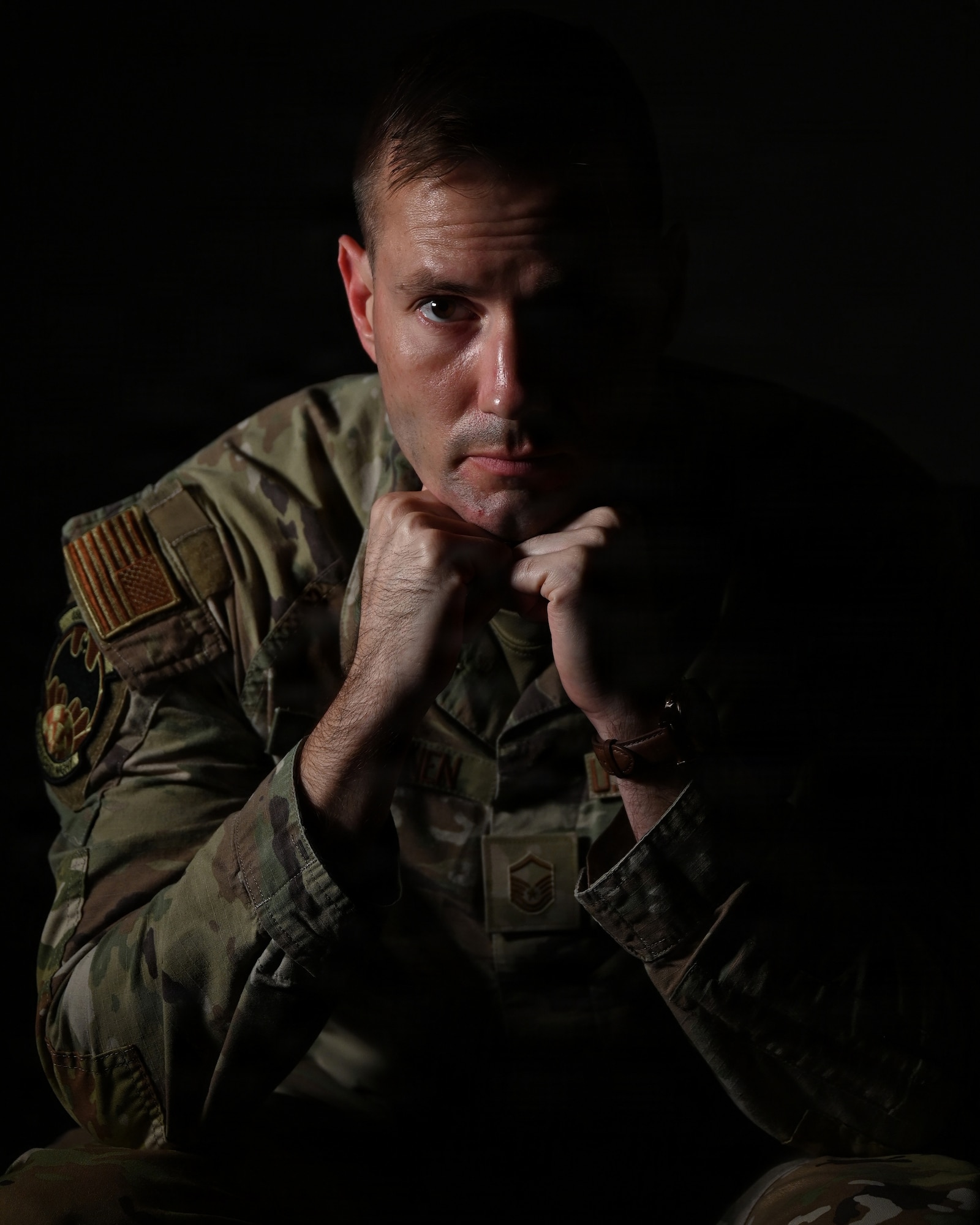 U.S. Air Force Master Sgt. Timka Peltonen, 488th Intelligence Squadron, poses for a photo representing the dark days of his life when he hit rock bottom and his future looked bleak, at RAF Mildenhall, England, Oct. 7, 2025. Peltonen, a recovering alcoholic, has been sober for almost seven years and finally found his zest for life after self-referring to the Alcohol and Drug Abuse Prevention and Treatment program between 2016 and 2019. With the help of good friends, leadership, ADAPT doctors and technicians, he turned his life around, gained a bachelor’s degree in cyber security, and was selected for the Air Force’s Warrant Officer Training School.