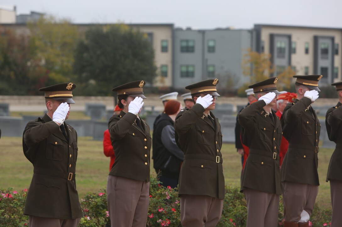 Texas A&M Corps of Cadets Honor Guardsmen from Texas A&M University salute during the funeral of Lt. Gen. John H. Miller (ret.), Aggie Field of Honor & Memorial Cemetery, College Station, Texas, Dec. 5, 2025. Lt. Gen. Miller, highly decorated Marine, served loyally for nearly four decades in the United States Marine Corps. He began his career in 1943, enlisting in the Marine Corps Reserve, attended and commissioned as a Marine Corps officer out of Texas A&M and retired as a Lt. Gen., serving in three different wars.  He served valiantly earning a Bronze Star Medal and the Purple Heart Medal among other military awards. (U.S. Marine Corps photos by LCpl. Donnell Brown)