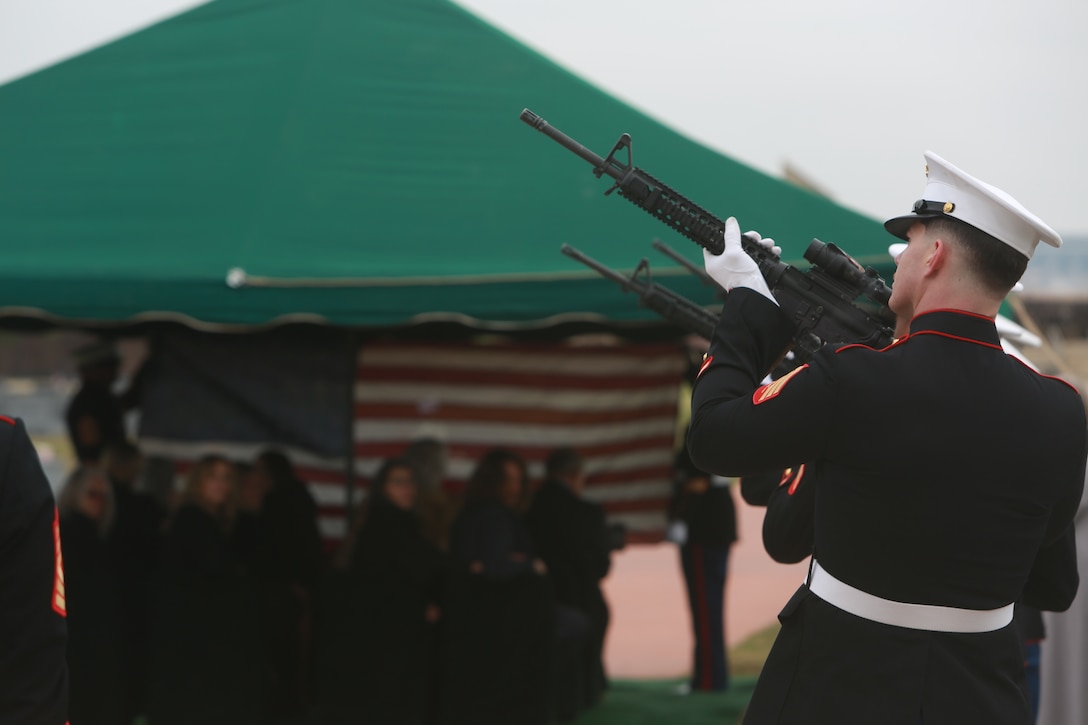 United States Marines render a 21-gun salute in sight of friends and family during the funeral of Lt. Gen. John H. Miller (ret.), Aggie Field of Honor & Memorial Cemetery, College Station, Texas, Dec. 5, 2025.  Lt. Gen. Miller (ret.), highly decorated Marine, served loyally for nearly four decades in the United States Marine Corps. He began his career in 1943, enlisting in the Marine Corps Reserve, attended and commissioned as a Marine Corps officer out of Texas A&M and retired as a Lt. Gen., serving in three different wars.  He served valiantly earning a Bronze Star Medal and the Purple Heart Medal among other military awards. (U.S. Marine Corps photos by LCpl. Donnell Brown)