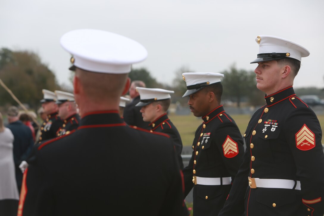U.S. Marines pay their respects to deceased Lt. Gen. John H. Miller (ret.), Aggie Field of Honor and Memorial Cemetery, College Station, Texas, Dec. 5, 2025. Lt. Gen. Miller (ret.), highly decorated Marine, served loyally for nearly four decades in the United States Marine Corps. He began his career in 1943, enlisting in the Marine Corps Reserve, attended and commissioned as a Marine Corps officer out of Texas A&M and retired as a Lt. Gen., serving in three different wars. He served valiantly earning a Bronze Star Medal and the Purple Heart Medal among other military awards. (U.S. Marine Corps photo by LCpl. Donnell Brown)