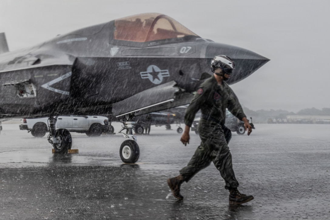 U.S. Marines with Marine Fighter Attack Squadron (VMFA) 225, U.S. Marine Corps Forces, South, guides a U.S. Marine Corps F-35B Lightning II assigned to VMFA-225 at Jose Aponte de la Torre Airport in Ceiba, Puerto Rico, Nov. 26, 2025. U.S. military forces are deployed to the Caribbean in support of the U.S. Southern Command mission, Department of War-directed operations, and the president’s priorities to disrupt illicit drug trafficking and protect the homeland. (U.S. Marine Corps photo)