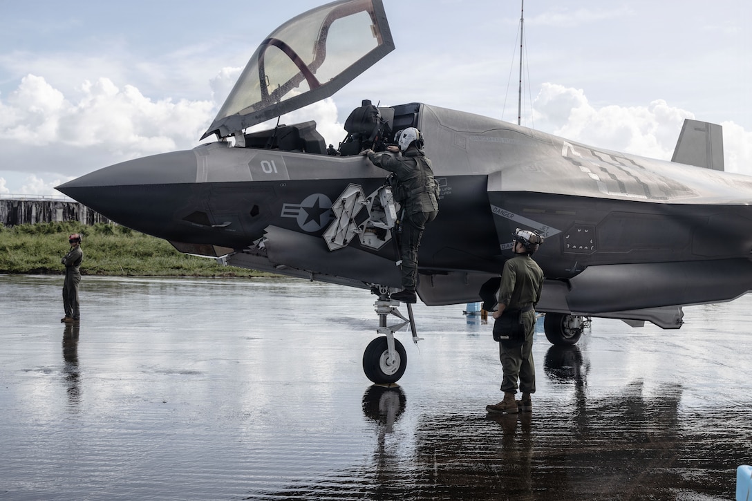A U.S. Marine Corps pilot with Marine Fighter Attack Squadron (VMFA) 225, U.S. Marine Corps Forces, South, climbs into the cockpit of a U.S. Marine Corps F-35B Lightning II assigned to VMFA-225 at Jose Aponte de la Torre Airport in Ceiba, Puerto Rico, Nov. 17, 2025. U.S. military forces are deployed to the Caribbean in support of the U.S. Southern Command mission, Department of War-directed operations, and the president’s priorities to disrupt illicit drug trafficking and protect the homeland. (U.S. Marine Corps photo)