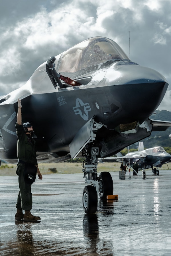 A U.S. Marine Corps plane captain with Marine Fighter Attack Squadron (VMFA) 225, U.S. Marine Corps Forces, South, inspects the refueling probe on a U.S. Marine Corps F-35B Lightning II assigned to VMFA-225 at Jose Aponte de la Torre Airport in Ceiba, Puerto Rico, Nov. 26, 2025. U.S. military forces are deployed to the Caribbean in support of the U.S. Southern Command mission, Department of War-directed operations, and the president’s priorities to disrupt illicit drug trafficking and protect the homeland. (U.S. Marine Corps photo)