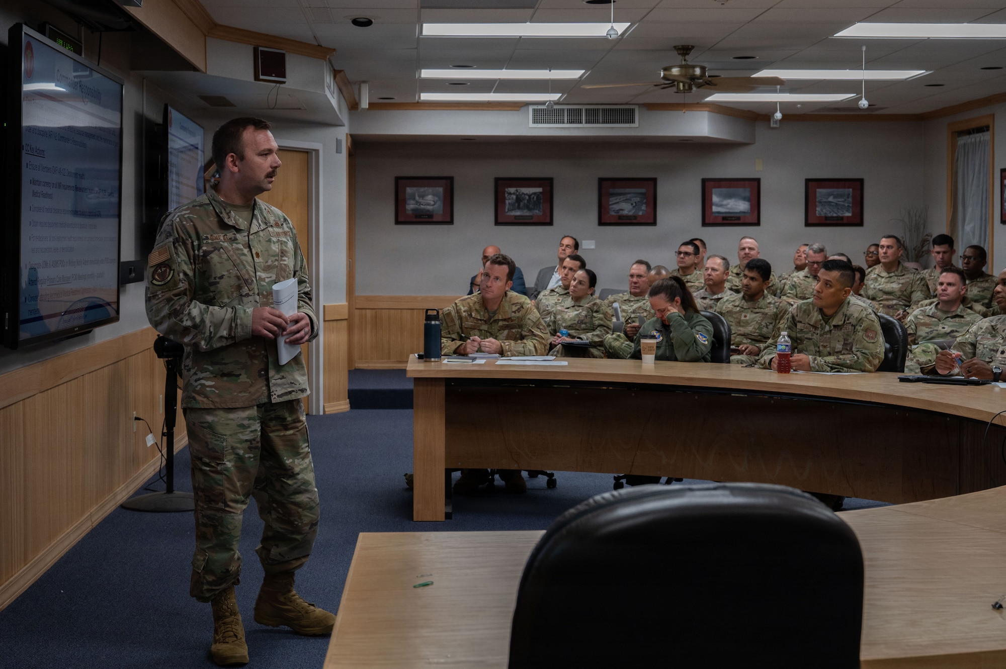 U.S. Air Force Maj. James O’Neal, 7th Medical Group physician assistant, briefs Dyess leadership during the Medical Readiness Symposium at Dyess Air Force Base, Texas, Oct. 28, 2025. This training builds shared awareness between leaders and medical teams, ensuring Airmen receive the support needed to remain mission-ready. (U.S. Air Force photo by Senior Airman Alondra Cristobal Hernandez)