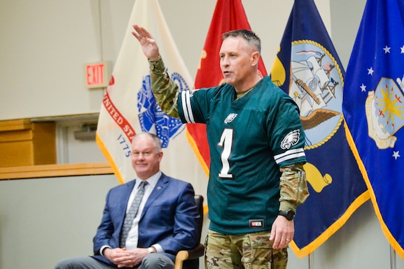 Man wearing Eagles shirt