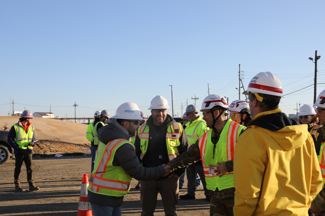 Col. Jesse T. Curry, Commander and Division Engineer of the U.S. Army Corps of Engineers North Atlantic Division, meets with a contractor during a Dec. 3, 2025 visit to Chambers Works FUSRAP (Formerly Used Sites Remedial Action Program) site. USACE is addressing radiological contamination at the site associated with the Manhattan Project.