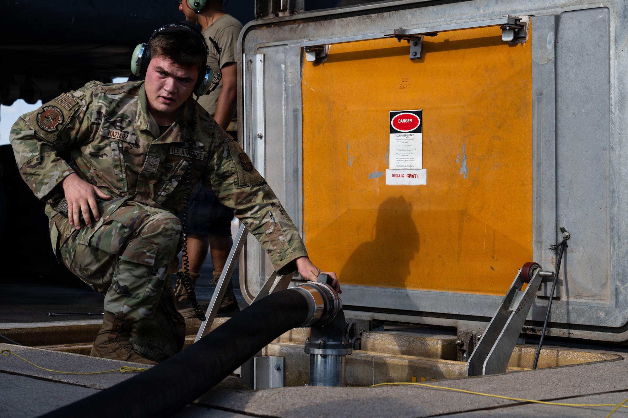 U.S. Air Force Airman 1st Class Joseph Maziarz, 7th Logistics Readiness Squadron fuels distribution operator, conducts hot-pit refueling operations for a B-1B Lancer at Dyess Air Force Base, Texas, Sept. 15, 2025. Hot-pit refueling is the practice of refueling an aircraft with engines running, which increases response time and enables more effective power projection capabilities (U.S. Air Force photo by Senior Airman Jade M. Caldwell)