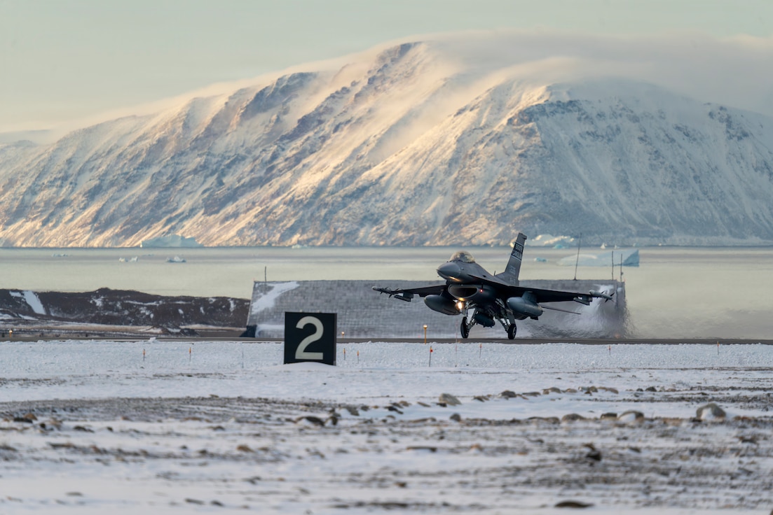 A North American Aerospace Defense Command F-16 Fighting Falcon fighter aircraft from the South Carolina ANG’s 169th FW lands at Pituffik Space Force Base, Greenland, Oct. 7, 2025. Operating in the Arctic provides the flexibility and adaptability needed to overcome logistical hurdles in a dynamic and unforgiving environment. Greenland as part of the Kingdom of Denmark has long played an important role in the defense of North America, which strengthens NORAD's ability to protect the continent from today’s threats and emerging challenges from all approaches. (U.S. Air Force photo by Staff Sgt. Maxim Dewolf)
