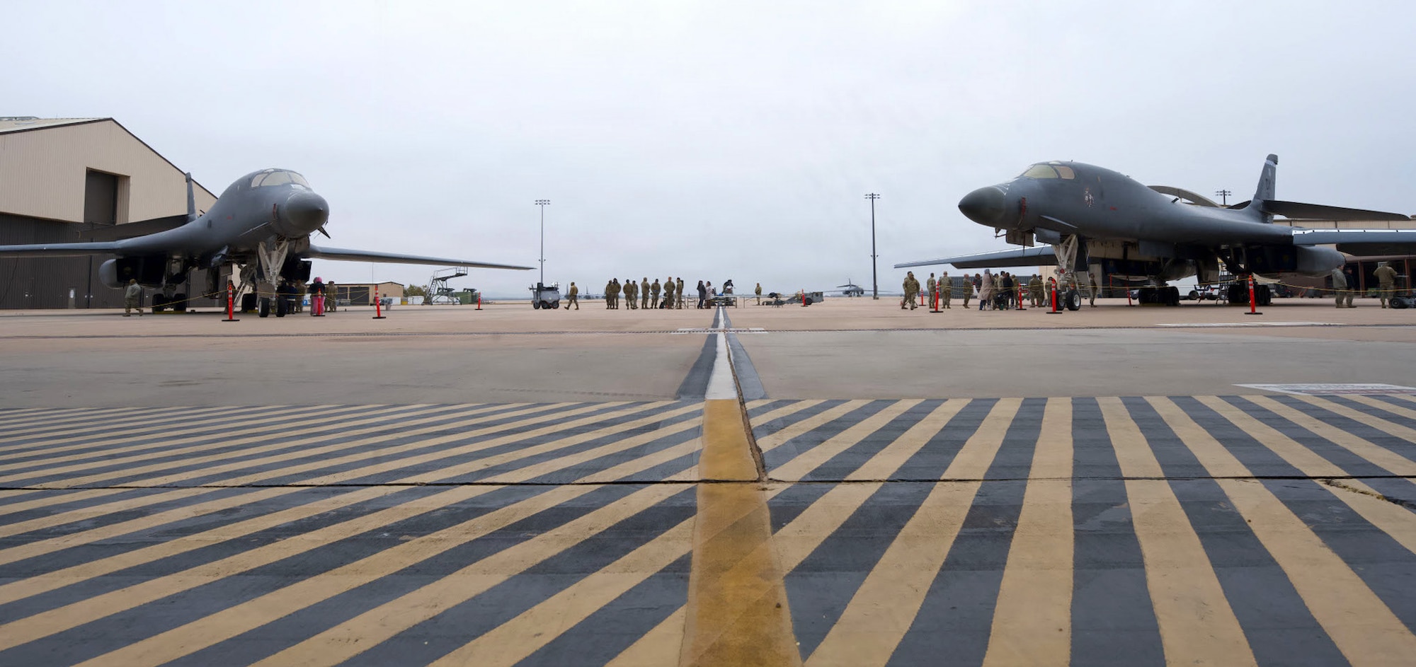 U.S. Air Force B-1B Lancers sit on the flightline during the annual Weapons Load Crew of the Year competition at Dyess Air Force Base, Texas, Dec. 4, 2025. The event featured teams from the 9th and 28th Bomber Generation Squadrons competing for the title of the 7th Bomb Wing’s best load crew. (U.S. Air Force photo by Senior Airman Emma Anderson)