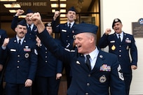 U.S. Air Force Chief Master Sgt. William Rawls, Air Force Recruiting Service chief recruiter, chants with recruiters and guests during the Operation Blue Suit Arrival Ceremony at Joint Base San Antonio-Randolph, Texas,